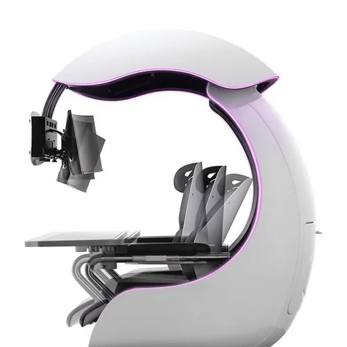 A chair with a computer and a screenDescription automatically generated with medium confidence