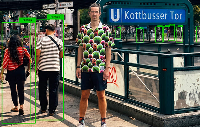 digital-camouflage-shirt-ai-video-surveillance-simon-weckert_dezeen_2364_col_12-1704x2272.jpg